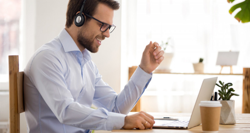 Man looking at laptop computer
